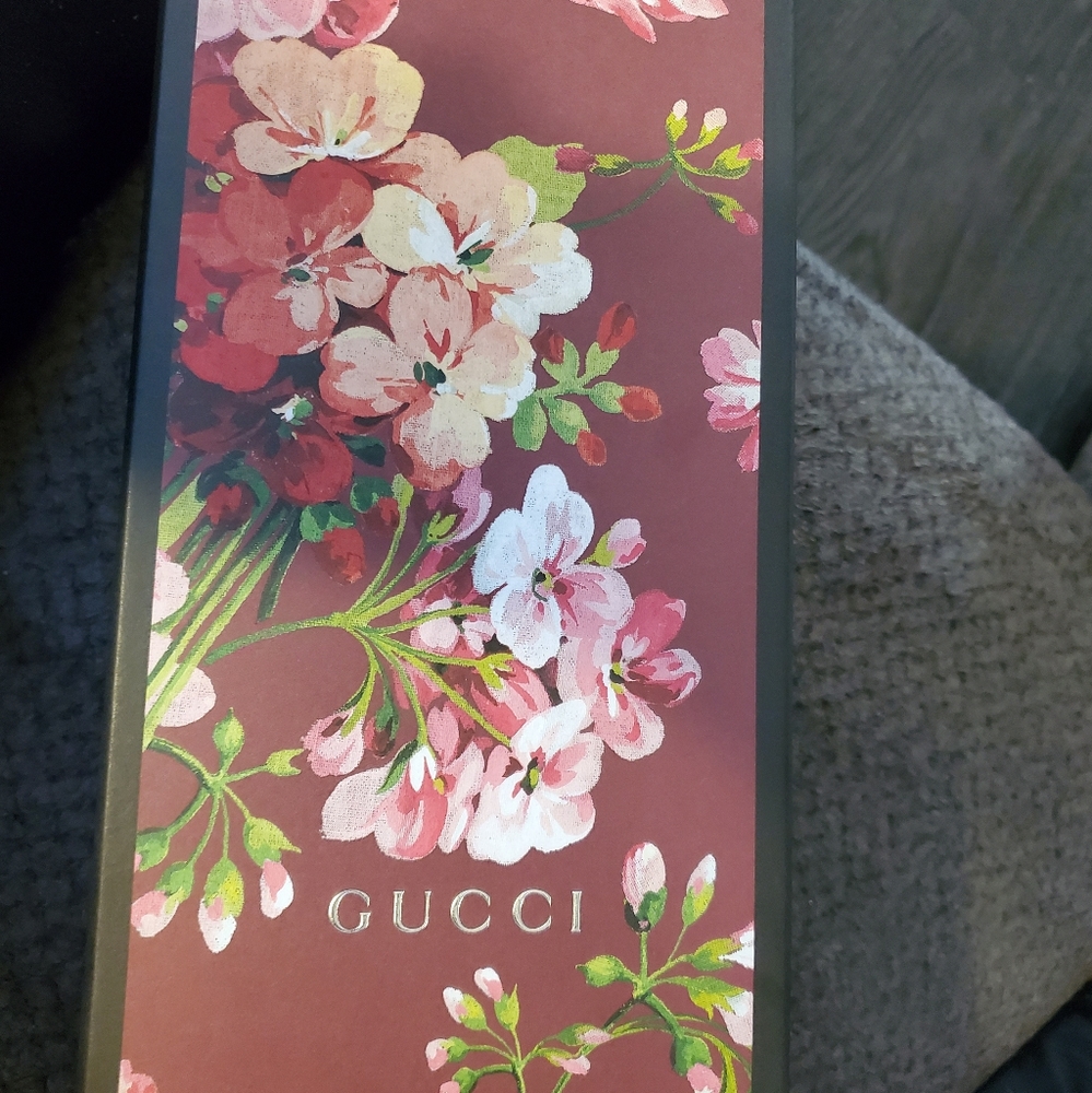 Gucci floral flip flops